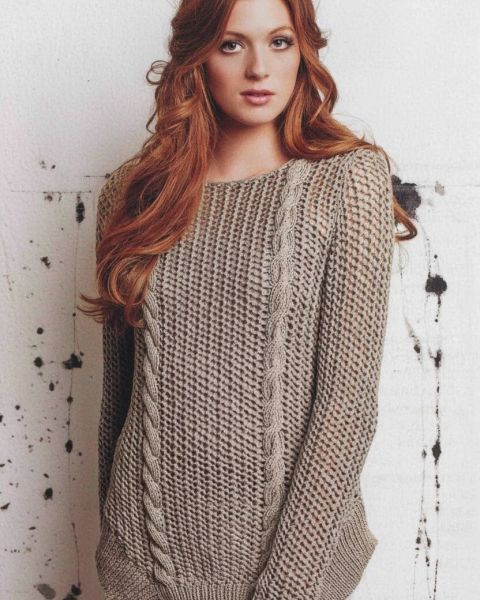 Sweater with an angular hem